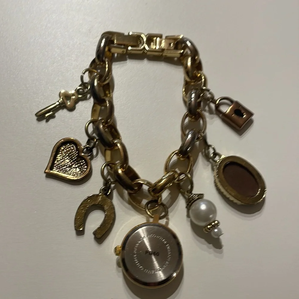 Gold Tone 7 Charms 7” Long Bracelet - Picture 6 of 6